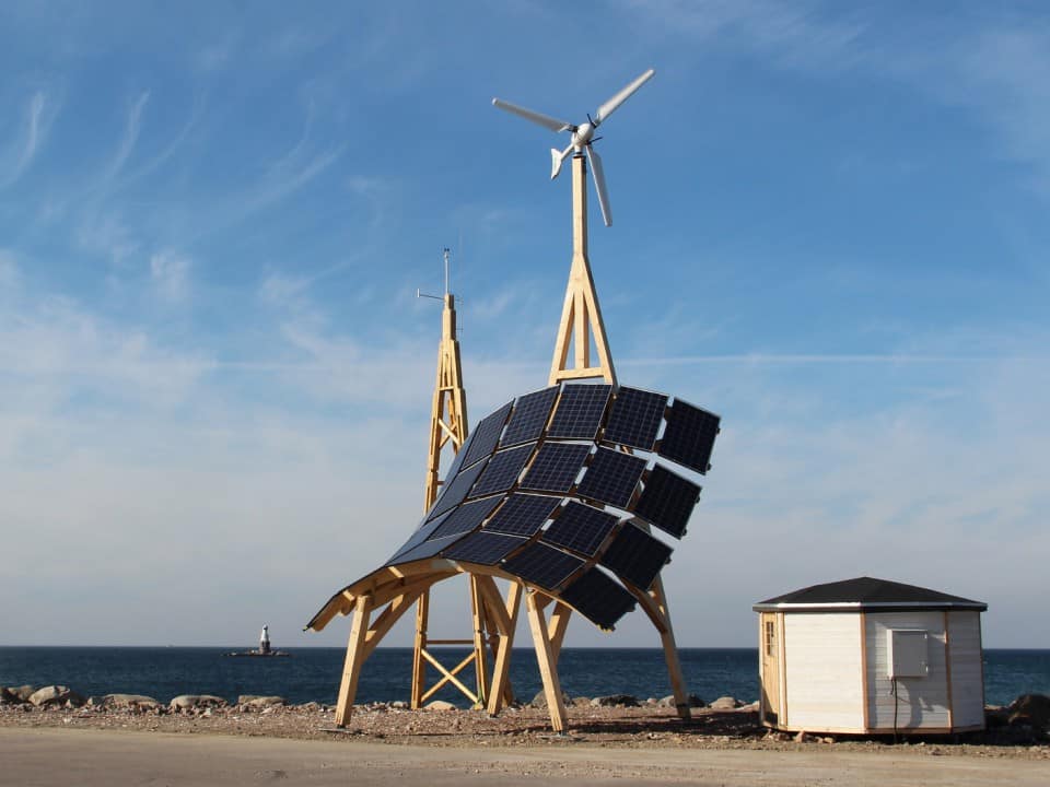Giraffe 2.0 small wind turbine and solar PV power station and EV charger on a wooden frame