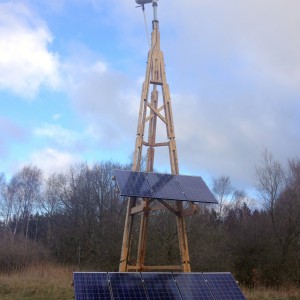 Dali PowerTower Performance small wind turbine and solar PV on a wooden tower installed in Sweden
