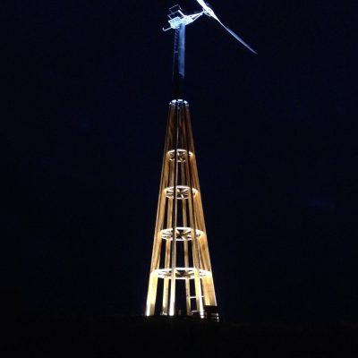Dalifant small wind turbine 11 kW on a wooden tower at night